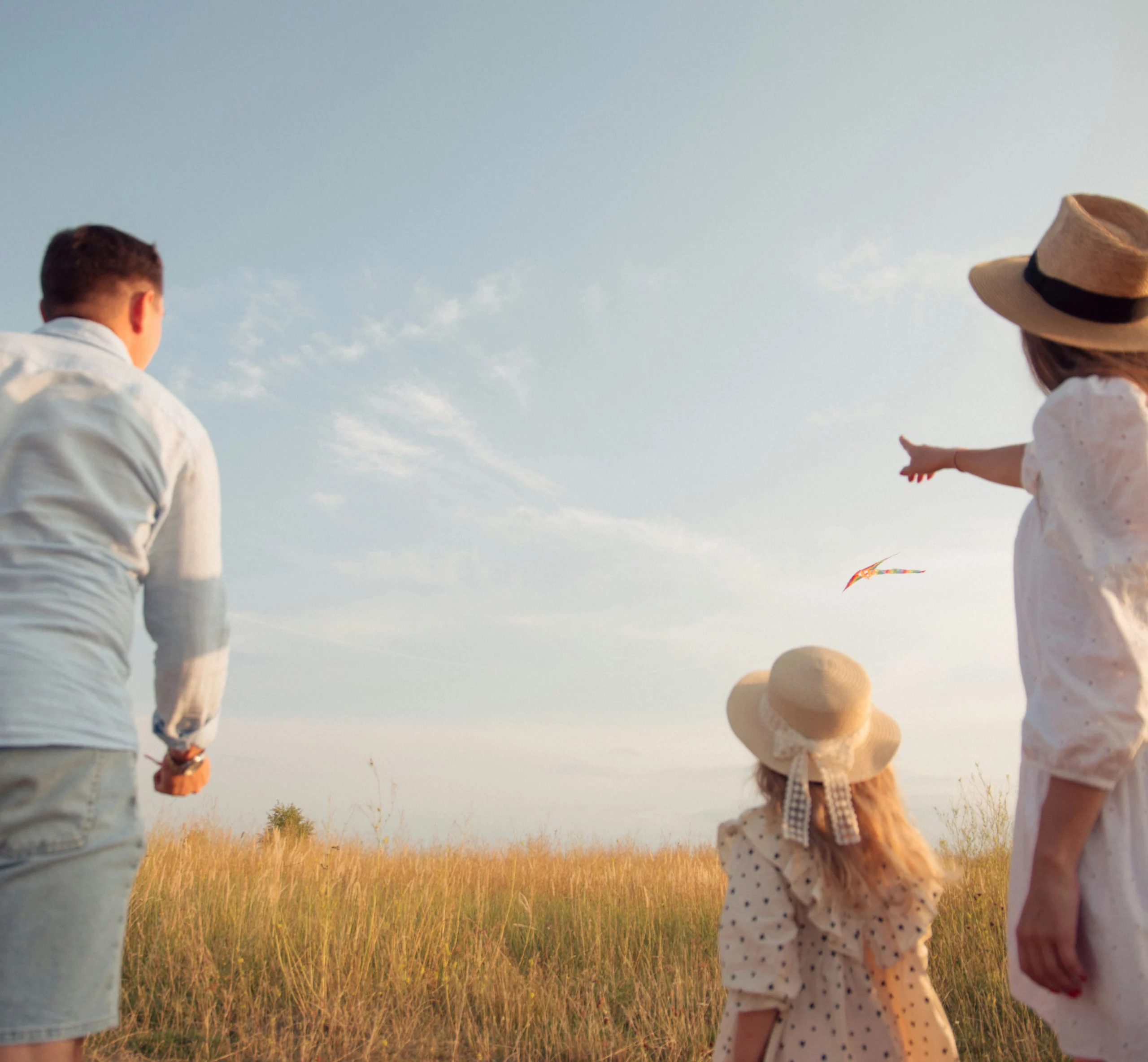 Famille dans un champ – Sécuriser son patrimoine